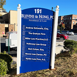 Outdoor attorney sign for Blevins & Hong, PC and associated law firms, installed by Marietta Signs in Marietta, GA.