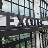 EXOTEC black channel letter sign on an industrial storefront—fabricated and installed by Marietta Signs, Metro Atlanta, GA.