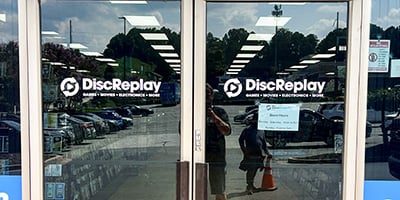 DiscReplay window decals installed for a rebrand by Marietta Signs in Kennesaw, Georgia