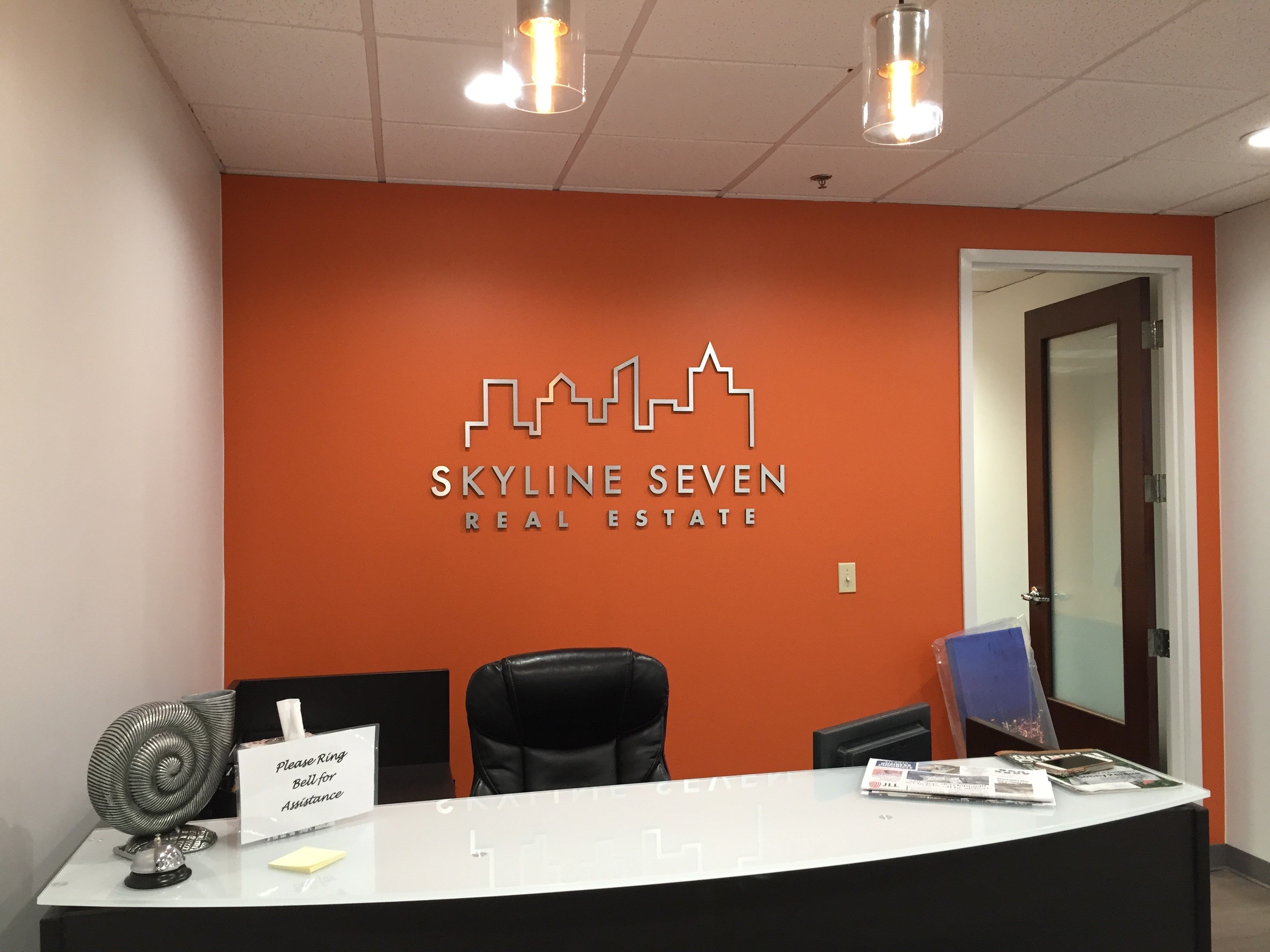 Skyline Seven Real Estate, lobby sign, office lobby signage, custom lobby signs, reception signs for business, attractive reception sign