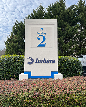 Custom monument sign for Imbera Building 2, featuring raised dimensional lettering and painted accents, fabricated and installed by Marietta Signs in Metro Atlanta, Georgia.