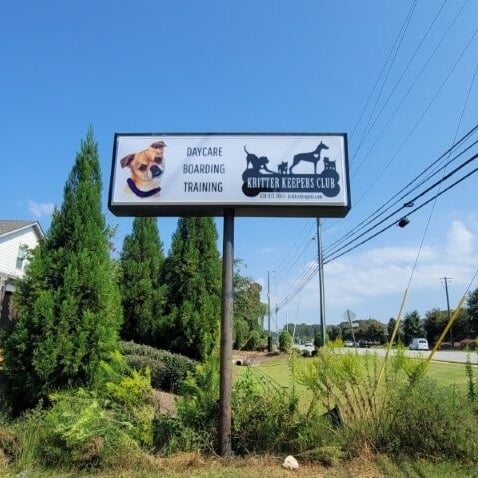 “Illuminated roadside pole sign (double-sided cabinet) installed by Marietta Signs in Marietta, GA